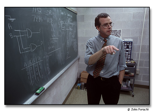 John Collins, Professor of Physics, making presentation on electronic circuitry. <br>During Math/Science Day for visiting high school students. <br>Wheaton College, Norton, Massachusetts. November 1999.