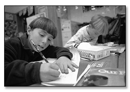 Students hard at work in Diane Forasté's classroom in the Multi-Aged Collaborative (grades 1-3). <br>Nayatt School, Barrington, Rhode Island. November 1996.