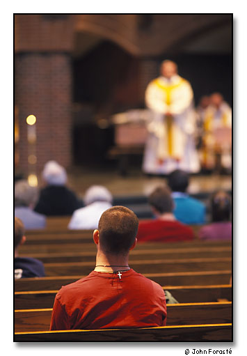 Sunday Mass, Saint Anselm College (a Catholic and Benedictine college). <br>Manchester, New Hampshire. May 2002.