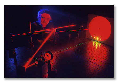 Hendrik Gerritsen, Professor of Physics, with laser in his research lab. <br>Brown University, Providence, Rhode Island. December 1987.