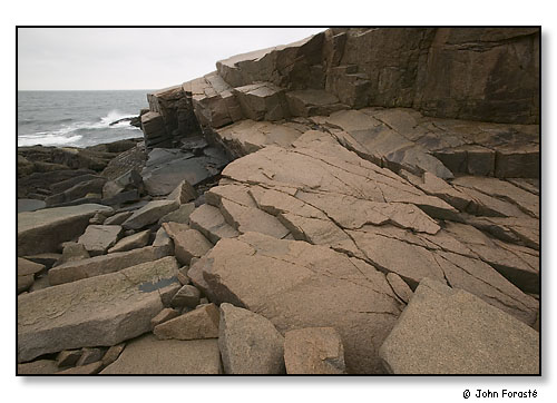Coastal granite rock and surf. Acadia National Park, Maine. April 2004.