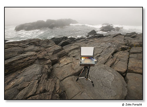 Artist's easel on rocks in fog. Monhegan Island, Maine. July 2004.