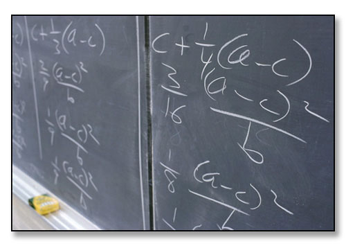 Detail of blackboard after Harl Ryder's class, Economics 113, Microeconomics. <br>Wilson Hall, Brown University, Providence, Rhode Island. April 1991.