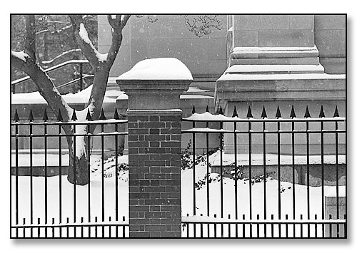 Detail of snow, fence & the John Carter Brown Library. <br>Brown University, Providence, Rhode Island. December 1995.