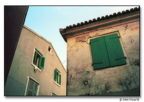 Detail of houses. <br>Paxos, Greece (island in the Ionian Sea off the west coast). July 1990.